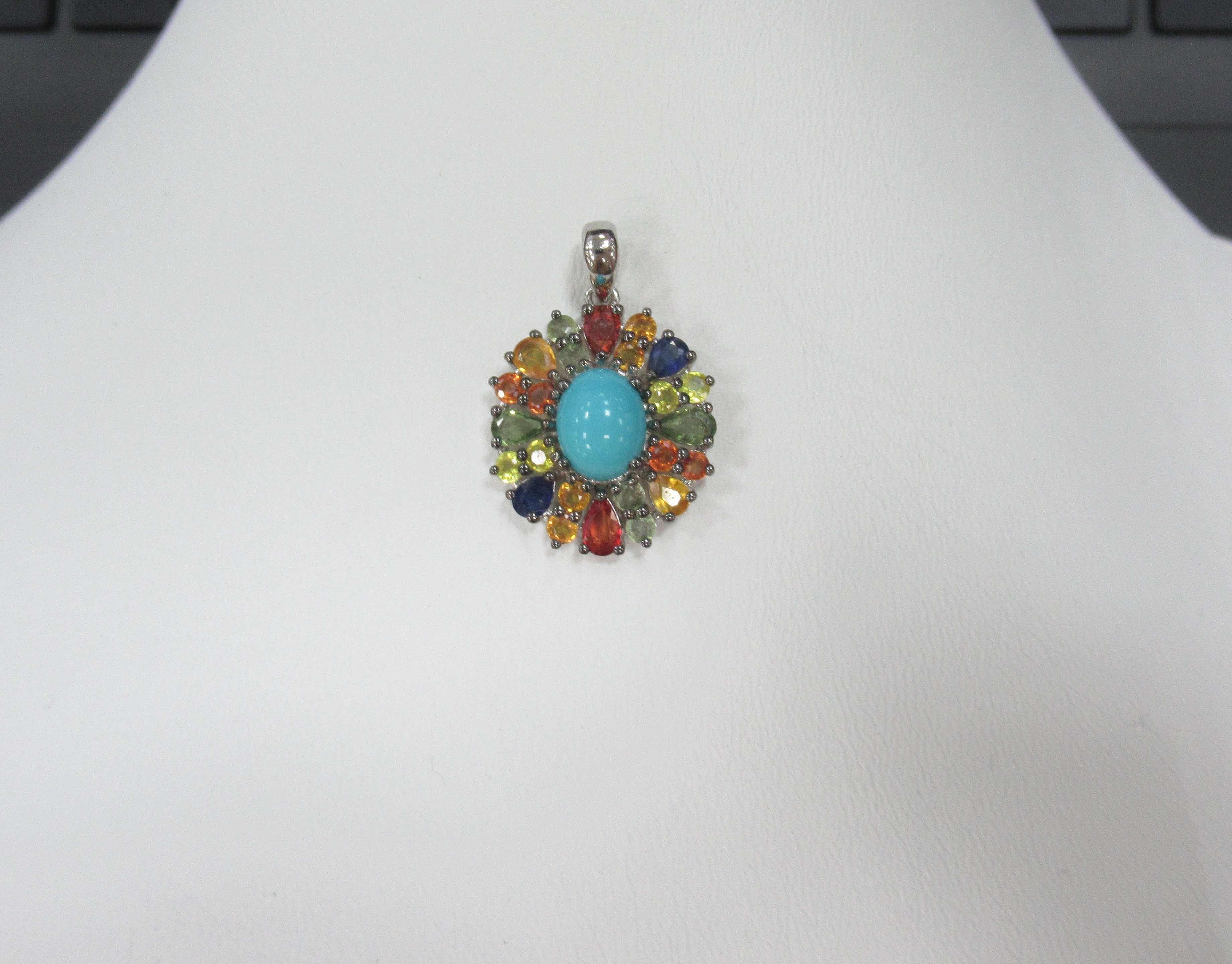 Серебряная подвеска с бирюзой и мультисапфирами